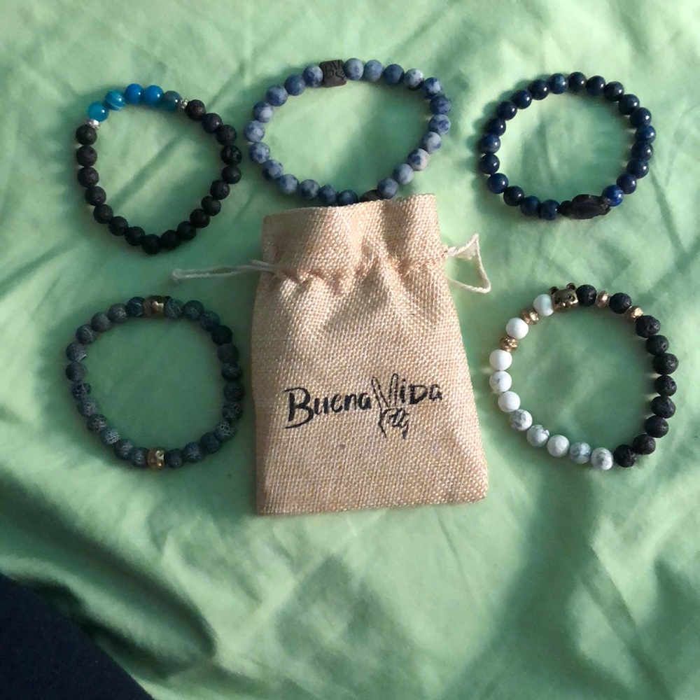 Very pretty beaded bracelets with cute bag!